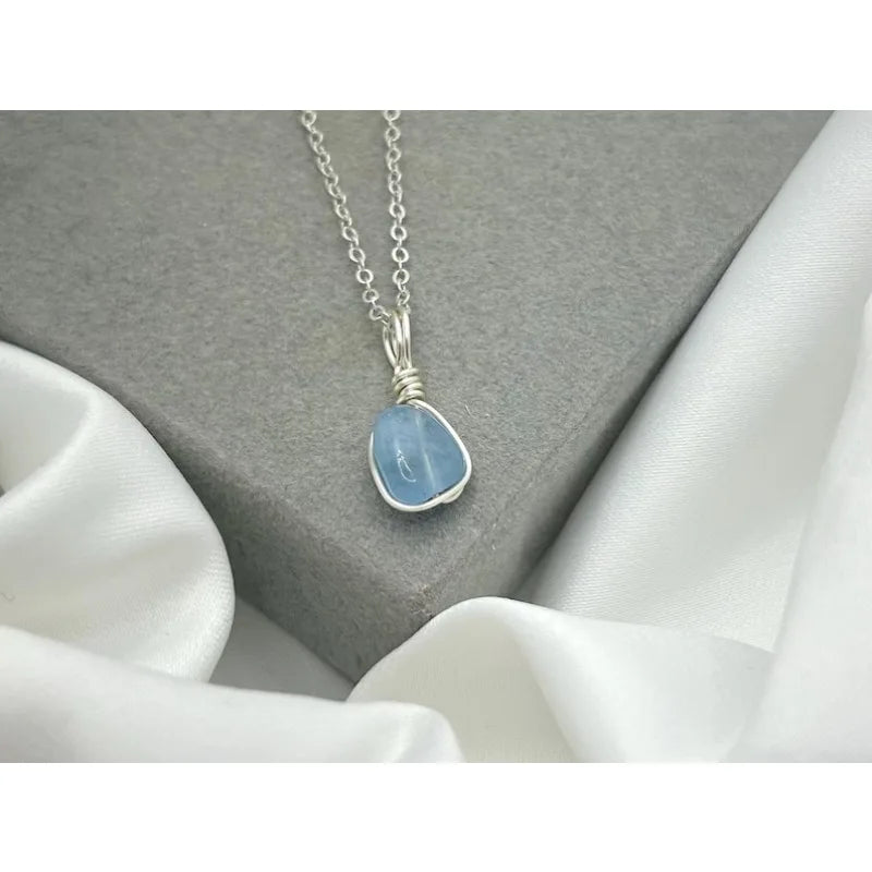 Aquamarine necklace: wire-wound silver-plated crystal pendant