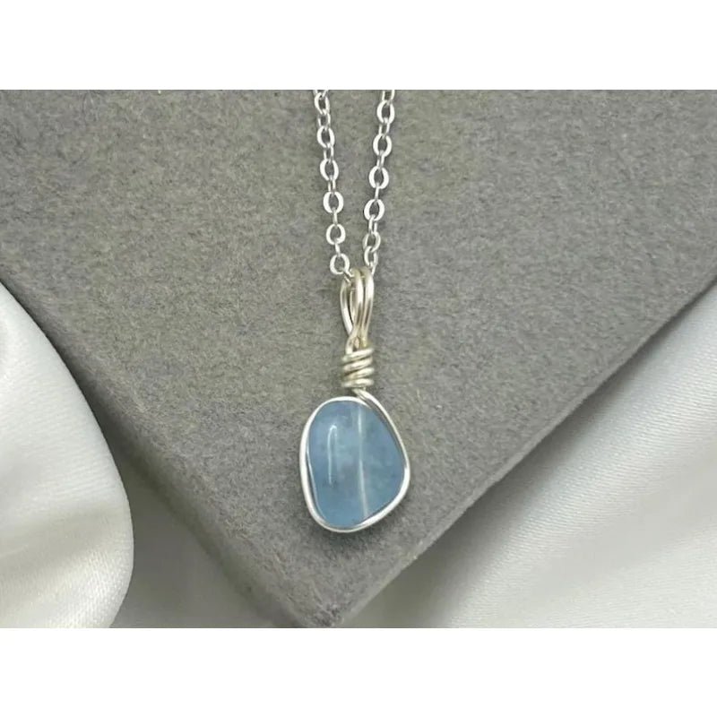 Aquamarine necklace: wire-wound silver-plated crystal pendant
