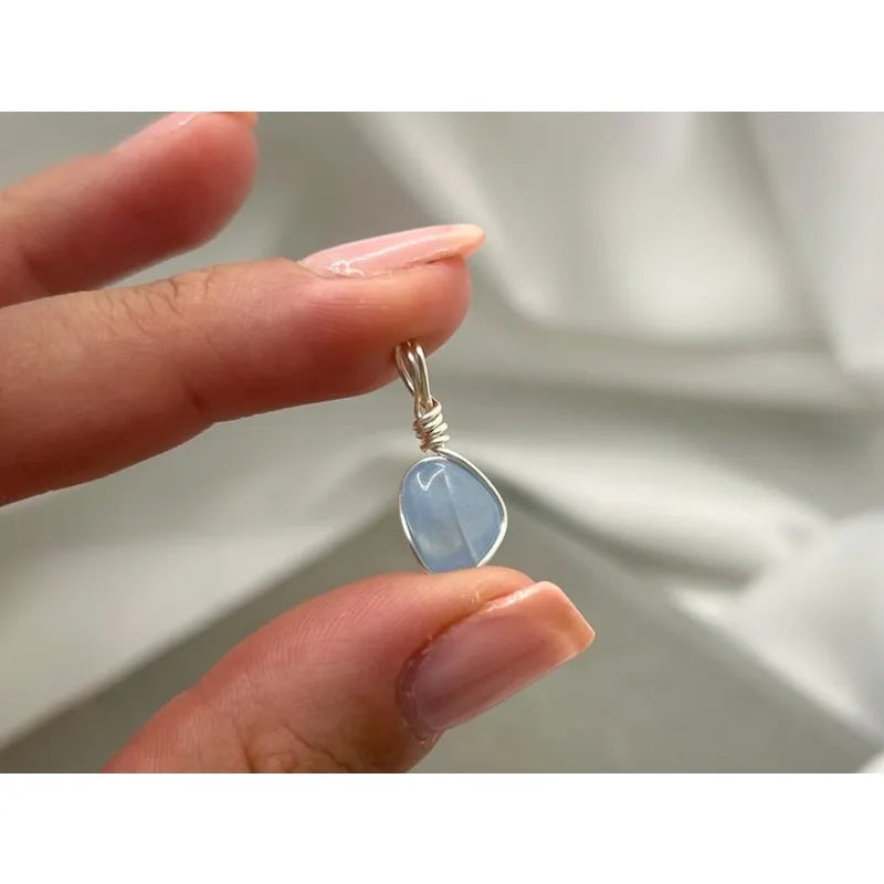 Aquamarine necklace: wire-wound silver-plated crystal pendant